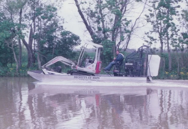Archival Faucheux airboat fitted with equipment on the water