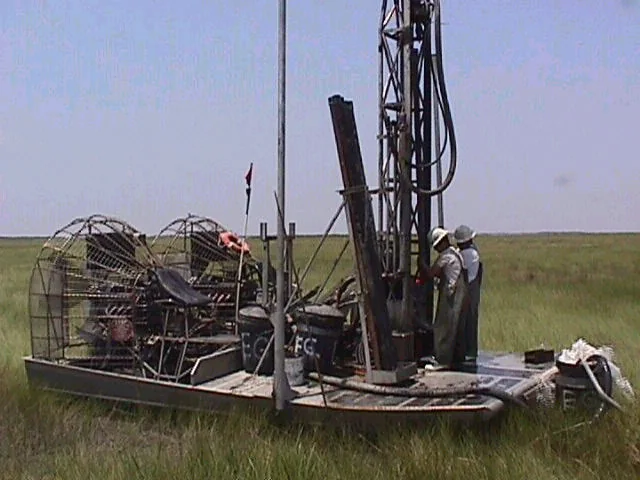 Seismic drilling mast mounted on a work airboat